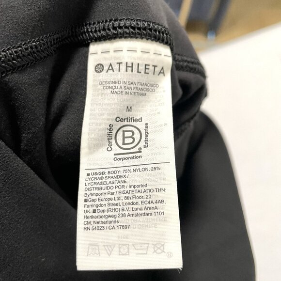 ATHLETA Salutation Stash Wrap Tight Leggings High Rise Gym Black size Medium - Picture 8 of 8